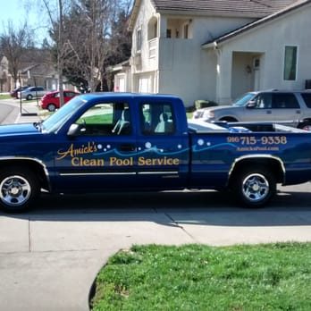 Amick's Clean Pool Service work truck with company branding and phone number